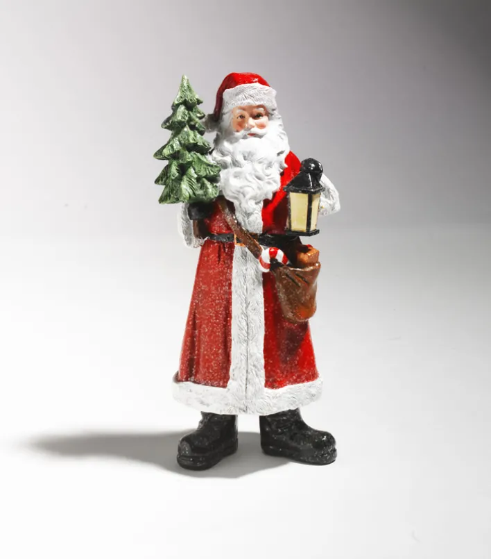 casaNova Deko-Figur Deko-Weihnachtsmann mit Tannenbaum 27 cm Mehrfarbig